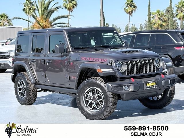 2026 Jeep Wrangler WRANGLER 4-DOOR RUBICON in Granite Crystal Metallic Clear-Coat Exterior Paint — front three-quarter view