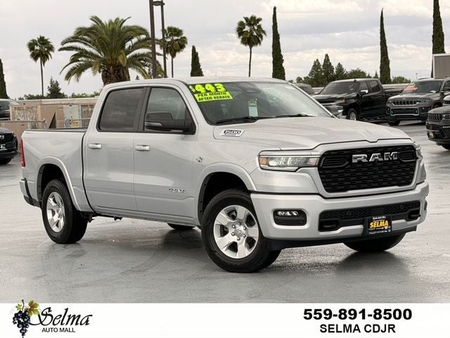 2026 RAM Ram 1500 RAM 1500 BIG HORN CREW CAB 4X4 5'7' BOX in Silver Zynith Exterior Paint — front three-quarter view
