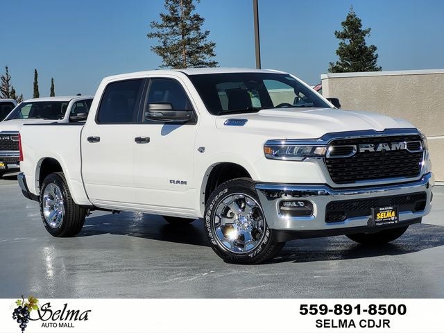 2026 RAM Ram 1500 RAM 1500 BIG HORN CREW CAB 4X4 5'7' BOX in Bright White Clear-Coat Exterior Paint — front three-quarter view