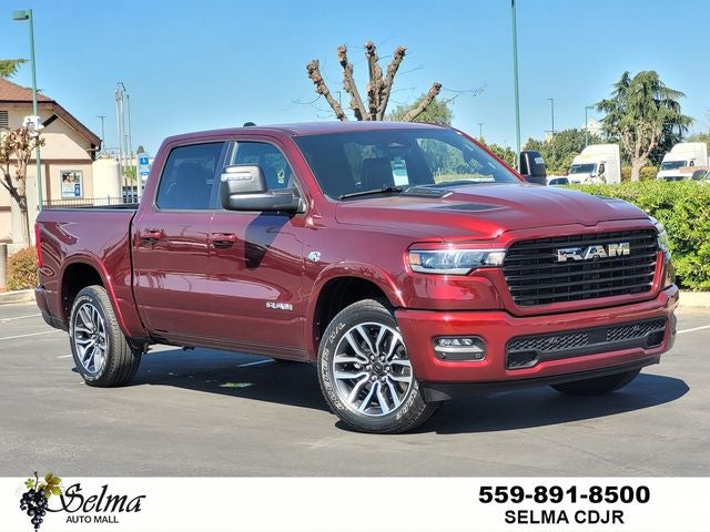 2026 RAM Ram 1500 RAM 1500 LARAMIE CREW CAB 4X4 5'7' BOX in Delmonico Red Pearl-Coat Exterior Paint — front three-quarter view