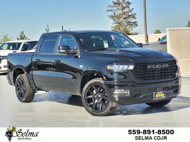 2026 RAM Ram 1500 RAM 1500 LARAMIE CREW CAB 4X4 5'7' BOX in Diamond Black Crystal Pearl-Coat Exterior Paint — front three-quarter view