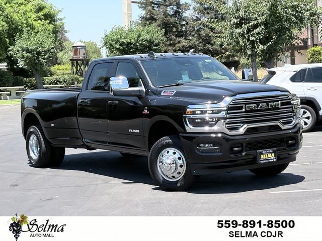 2026 RAM Ram 3500 RAM 3500 LARAMIE CREW CAB 4X4 8' BOX in Diamond Black Crystal Pearl-Coat Exterior Paint — front three-quarter view