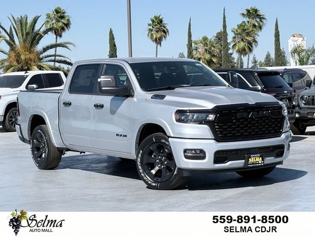 2026 RAM Ram 1500 RAM 1500 BIG HORN CREW CAB 4X4 5'7' BOX in Silver Zynith Exterior Paint — front three-quarter view