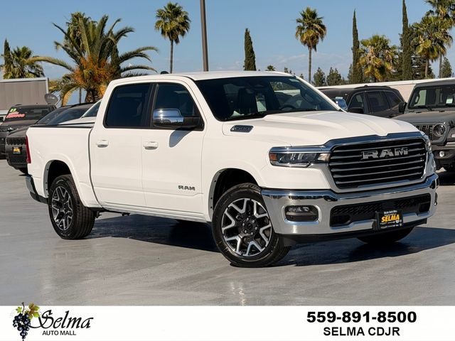 2026 RAM Ram 1500 RAM 1500 LARAMIE CREW CAB 4X4 5'7' BOX in Bright White Clear-Coat Exterior Paint — front three-quarter view